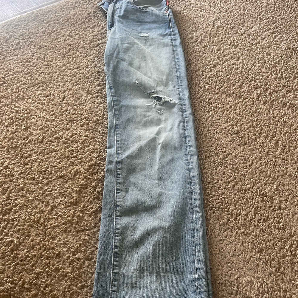 Women's Distressed Blue Jeans